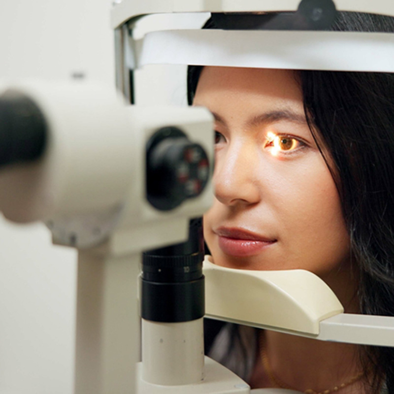 woman undergoing an eye exam